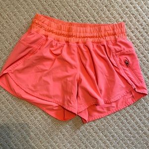 Lululemon orange tracker shorts